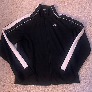 Worn a few times, has no issues, vintage Nike Zip, windbreaker material